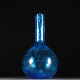 A blue glass celestial ball bottle from the Qing Dynasty