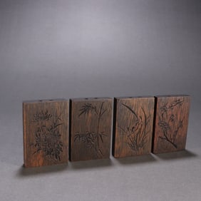 A set of agarwood plum orchids and bamboo chrysanthemums of the Qing Dynasty
