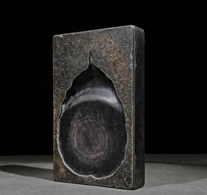 A rectangular end inkstone engraved with a Bodhi leaf