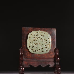 A mahogany inlaid jade cloud dragon pattern insert from the Qing Dynasty