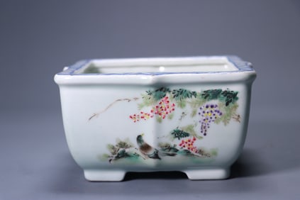 A pastel flower and bird pattern flower pot