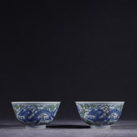 A pair of Ming Dynasty Chenghua blue and white bucket colorful watermelon dragon pattern cups