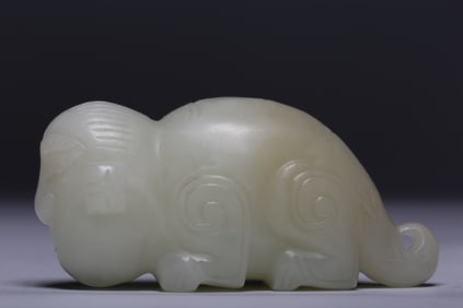 A Hetian white jade human-faced beast figurine
