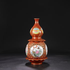A Qing Dynasty Qianlong enamel color hollow gold painting window opening flower and bird turning