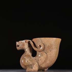 An ancient jade dragon cup of the Han Dynasty