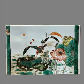 A porcelain plate paperweight from the Qing Dynasty
