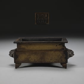 A precisely cast copper lion head ear four-square furnace of the Ming Dynasty