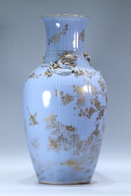 A Qing Dynasty sky blue glaze gold-painted dragon pattern appreciation vase