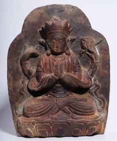 A stone carving lacquered four-armed Guanyin stone slab from the Qing Dynasty