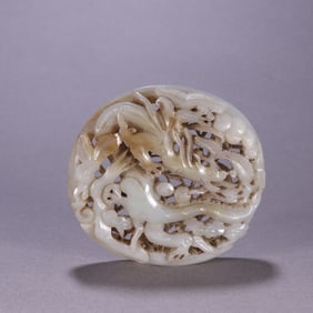 A Ming Dynasty Hetian jade carved cloud dragon pattern tile