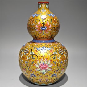 A gold enamel color passionflower Fulu Shou gourd bottle made in the Qianlong era