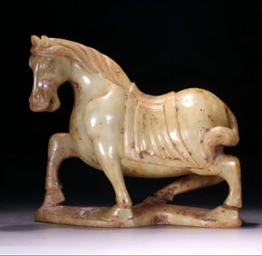 An ancient jade horse ornament