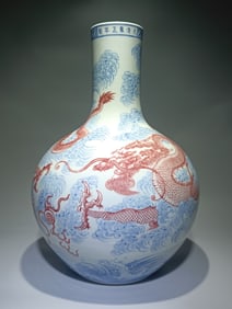 A blue and white glazed red sea water cloud dragon pattern celestial ball bottle made in the