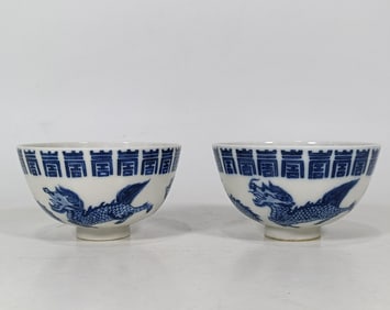 A Qing Dynasty Guangxu blue and white beast chicken heart cup