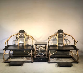 A set of three rosewood antler chairs