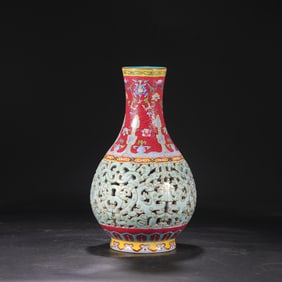 A Qing Dynasty Qianlong enamel color hollow flower vase