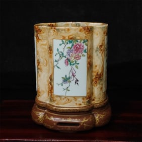A fine stone pattern glazed open-window pastel flower and bird pen holder made in the Qianlong era