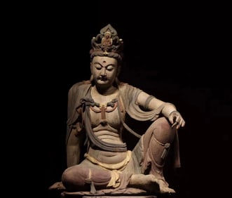 A beautiful wood carving painted Guanyin