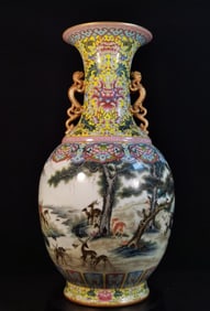 A Qing Qianlong enamel color hundred deer dragon ear bottle