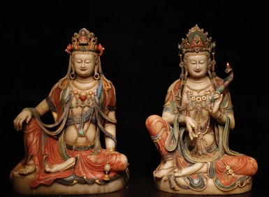 A pair of white jade painted Guanyin from the Tang Dynasty