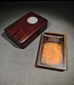 A pine inkstone with a white jade mahogany box inlaid with it