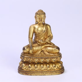 A fine copper-gilt Shakyamuni small inch Buddha
