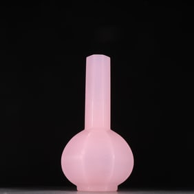 A beautiful pink glass Bafang bottle