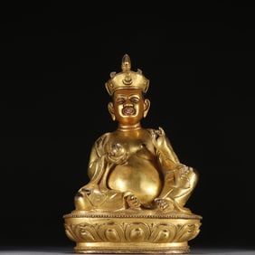 A bronze gilt seated statue of a guru in the Qing Dynasty