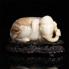 A Qing Dynasty Hetian white jade Taiping elephant ornament