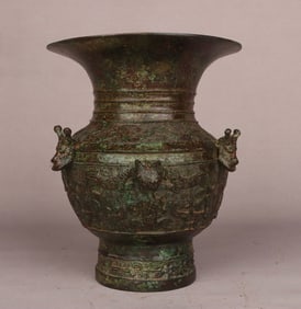 A Western Zhou bronze dragon and tiger statue