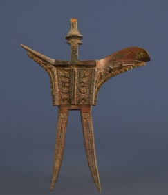 A Han Dynasty bronze four-legged square cup