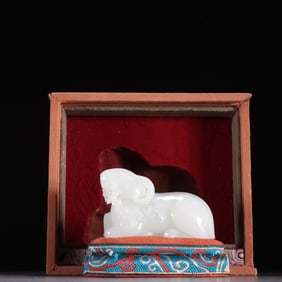 A Qing Dynasty Hetian jade sheep ornament