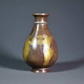 A Tang Dynasty partially gilded bottle