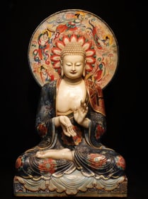 A white jade painted Buddha from the Tang Dynasty