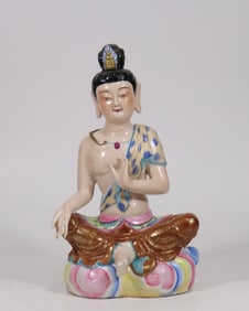 A Qing Dynasty Qianlong pastel Guanyin statue