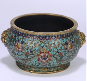 A cloisonné entwined lotus pattern double lion's ear stove made in the Qianlong period of the Qing