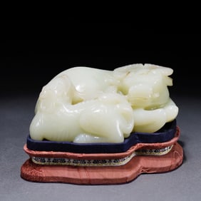 A beautiful Hetian jade cow ornament
