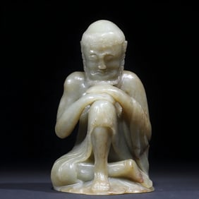 A statue of Hetian jade carved Snow Mountain Guanyin