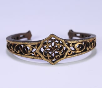 A fine iron-cut gold openwork tangle bracelet