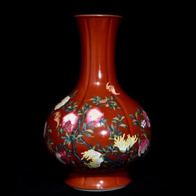 A Qing Qianlong alum red pastel Fushou pattern melon edge bottle