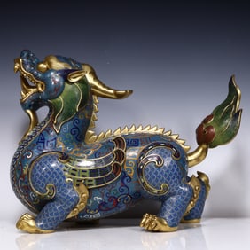 A Qing Dynasty cloisonné unicorn beast