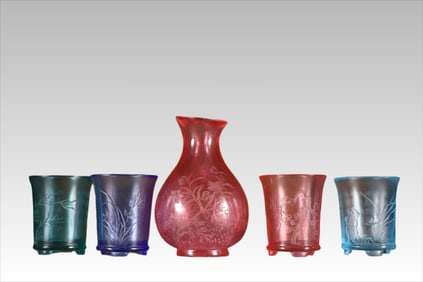 A set of Qing Dynasty glazed plum orchids and bamboo chrysanthemums carved poetry and wine utensils