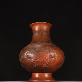 A Qing Dynasty bamboo carved bat pattern bottle