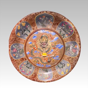 A plate carved with a dragon in the Qing Dynasty