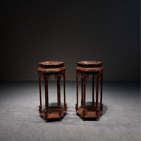 A set of yellow rosewood hexagonal flower stands