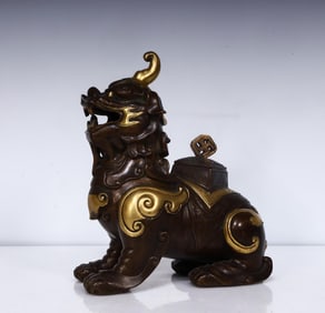 A Qing Dynasty copper unicorn incense burner