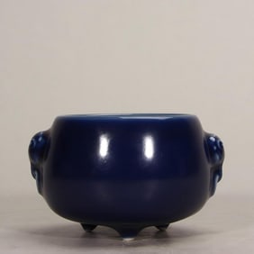A piece of Qing Qianlong sapphire blue glaze three-legged beast ear stove
