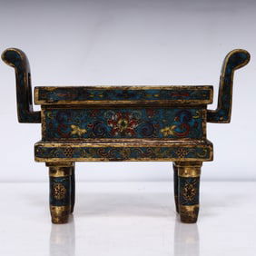 A Qing Dynasty cloisonné manger-shaped incense burner
