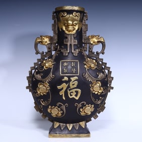 A Qing Dynasty Qianlong copper Fushou vase