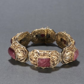 A Qing Dynasty silver-gilt tourmaline hand-filed